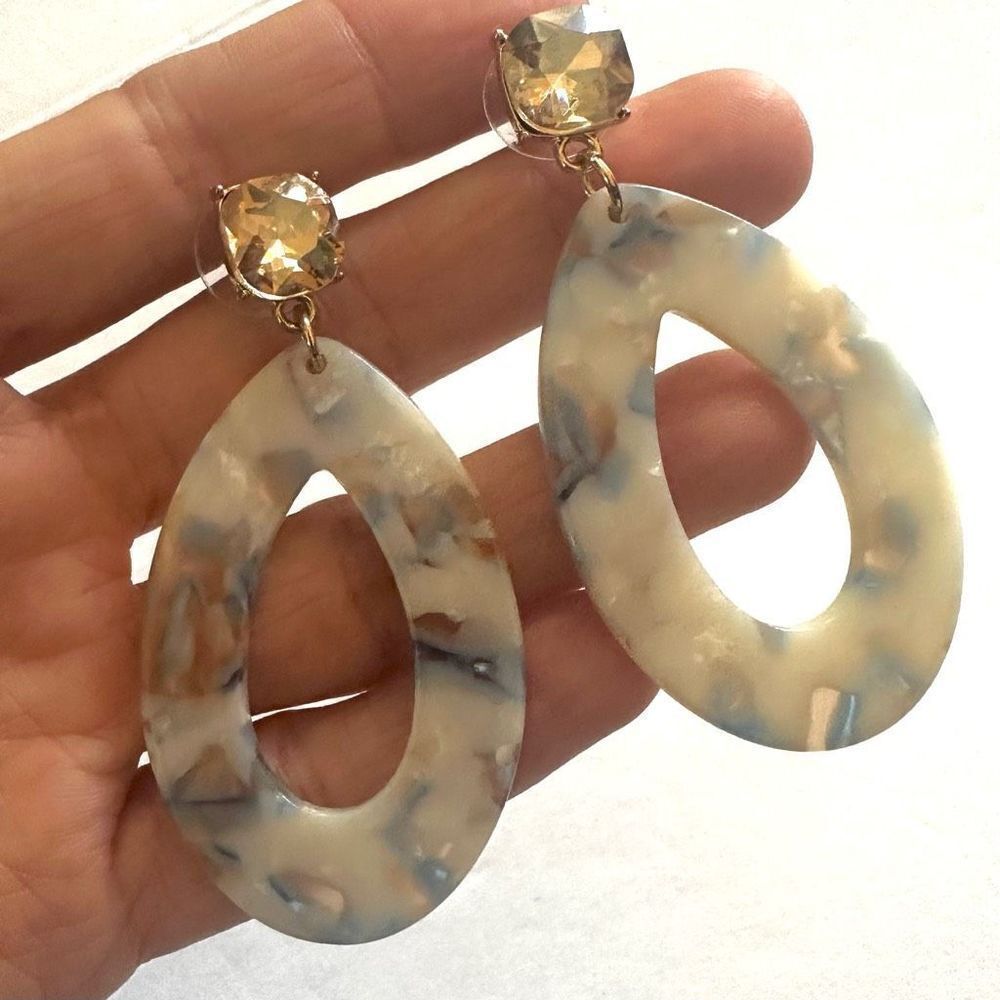 Oval blue and white acrylic earrings
